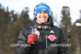 03.03.2011, Khanty-Mansiysk, Russia (RUS): Michael Greis (GER), Madshus, Rottefella, OneWay, adidas - IBU world championships biathlon, medals, Khanty-Mansiysk (RUS). www.xpb.cc. © Manzoni/xpb.cc. Every downloaded picture is fee-liable.