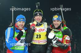 08.03.2011, Khanty-Mansiysk, Russia (RUS): (L-R): Maxim Maksimov (RUS), Madshus, Rottefella, Swix, adidas, Tarjei Boe (NOR), Fischer, Rottefella, Swix, ODLO, Christoph Sumann (AUT), Atomic, Leki  - IBU world championships biathlon, medals, Khanty-Mansiysk (RUS). www.xpb.cc. © Manzoni/xpb.cc. Every downloaded picture is fee-liable.