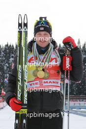 06.03.2011, Khanty-Mansiysk, Russia (RUS): Tarjei Boe (NOR), Fischer, Rottefella, Swix, ODLO - IBU world championships biathlon, medals, Khanty-Mansiysk (RUS). www.xpb.cc. © Manzoni/xpb.cc. Every downloaded picture is fee-liable.