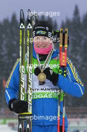 06.03.2011, Khanty-Mansiysk, Russia (RUS): Helena Ekholm (SWE), Fischer, Rottefella, Leki, adidas - IBU world championships biathlon, medals, Khanty-Mansiysk (RUS). www.xpb.cc. © Manzoni/xpb.cc. Every downloaded picture is fee-liable.