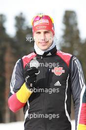 03.03.2011, Khanty-Mansiysk, Russia (RUS): Arnd Peiffer (GER), Fischer, Salomon, Swix, adidas - IBU world championships biathlon, medals, Khanty-Mansiysk (RUS). www.xpb.cc. © Manzoni/xpb.cc. Every downloaded picture is fee-liable.