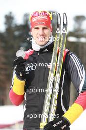 03.03.2011, Khanty-Mansiysk, Russia (RUS): Arnd Peiffer (GER), Fischer, Salomon, Swix, adidas - IBU world championships biathlon, medals, Khanty-Mansiysk (RUS). www.xpb.cc. © Manzoni/xpb.cc. Every downloaded picture is fee-liable.