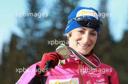 03.03.2011, Khanty-Mansiysk, Russia (RUS): Marie Laure Brunet (FRA), Rossignol, Rottefella, Swix - IBU world championships biathlon, medals, Khanty-Mansiysk (RUS). www.xpb.cc. © Manzoni/xpb.cc. Every downloaded picture is fee-liable.