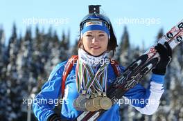 02.03.2011, Khanty-Mansiysk, Russia (RUS): Dorothea Wierer (ITA), Rossignol, Rottefella, Casco with her four gold and three silver medals from the Junior World Championships and the European Championship- IBU world championships biathlon, medals, Khanty-Mansiysk (RUS). www.xpb.cc. © Manzoni/xpb.cc. Every downloaded picture is fee-liable.