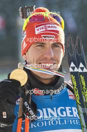 05.03.2011, Khanty-Mansiysk, Russia (RUS): Arnd Peiffer (GER), Fischer, Salomon, Swix, adidas - IBU world championships biathlon, medals, Khanty-Mansiysk (RUS). www.xpb.cc. Â© Miko/xpb.cc. Every downloaded picture is fee-liable.