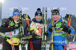 06.03.2011, Khanty-Mansiysk, Russia (RUS): (l-r): Magdalena Neuner (GER), Fischer, Rottefella, Exel, adidas, Kaisa Maekaeraeinen (FIN), Fischer, Rottefella, Leki, Odlo, Helena Ekholm (SWE), Fischer, Rottefella, Leki, adidas - IBU world championships biathlon, medals, Khanty-Mansiysk (RUS). www.xpb.cc. © Manzoni/xpb.cc. Every downloaded picture is fee-liable.