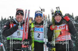 06.03.2011, Khanty-Mansiysk, Russia (RUS): (L-R): Emil Hegle Svendsen (NOR), Madshus, Rottefella, Swix, Odlo, Martin Fourcade (FRA), Rossignol, Rottefella, OneWay, Odlo, Tarjei Boe (NOR), Fischer, Rottefella, Swix, ODLO - IBU world championships biathlon, medals, Khanty-Mansiysk (RUS). www.xpb.cc. © Manzoni/xpb.cc. Every downloaded picture is fee-liable.