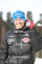 03.03.2011, Khanty-Mansiysk, Russia (RUS): Michael Greis (GER), Madshus, Rottefella, OneWay, adidas - IBU world championships biathlon, medals, Khanty-Mansiysk (RUS). www.xpb.cc. © Manzoni/xpb.cc. Every downloaded picture is fee-liable.