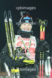 05.03.2011, Khanty-Mansiysk, Russia (RUS): Kaisa Maekaeraeinen (FIN), Fischer, Rottefella, Leki, Odlo - IBU world championships biathlon, medals, Khanty-Mansiysk (RUS). www.xpb.cc. © Manzoni/xpb.cc. Every downloaded picture is fee-liable.