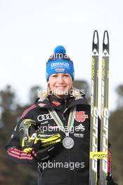 03.03.2011, Khanty-Mansiysk, Russia (RUS): Magdalena Neuner (GER), Fischer, Rottefella, Exel, adidas - IBU world championships biathlon, medals, Khanty-Mansiysk (RUS). www.xpb.cc. © Manzoni/xpb.cc. Every downloaded picture is fee-liable.