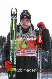 06.03.2011, Khanty-Mansiysk, Russia (RUS): Tarjei Boe (NOR), Fischer, Rottefella, Swix, ODLO - IBU world championships biathlon, medals, Khanty-Mansiysk (RUS). www.xpb.cc. © Manzoni/xpb.cc. Every downloaded picture is fee-liable.