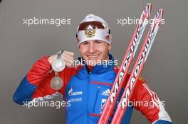 18.03.2011, Khanty-Mansiysk, Russia (RUS): Maxim Maksimov (RUS), Madshus, Rottefella, Swix, adidas - IBU world championships biathlon, medals, Khanty-Mansiysk (RUS). www.xpb.cc. © Manzoni/xpb.cc. Every downloaded picture is fee-liable.