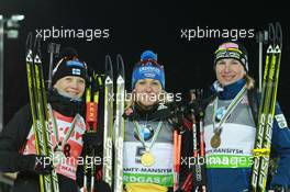 05.03.2011, Khanty-Mansiysk, Russia (RUS): (L-R): Kaisa Maekaeraeinen (FIN), Fischer, Rottefella, Leki, Odlo, Magdalena Neuner (GER), Fischer, Rottefella, Exel, adidas, Anastasiya Kuzmina (SVK), Fischer, Salomon, Exel - IBU world championships biathlon, medals, Khanty-Mansiysk (RUS). www.xpb.cc. © Manzoni/xpb.cc. Every downloaded picture is fee-liable.