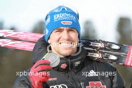 03.03.2011, Khanty-Mansiysk, Russia (RUS): Michael Greis (GER), Madshus, Rottefella, OneWay, adidas - IBU world championships biathlon, medals, Khanty-Mansiysk (RUS). www.xpb.cc. © Manzoni/xpb.cc. Every downloaded picture is fee-liable.