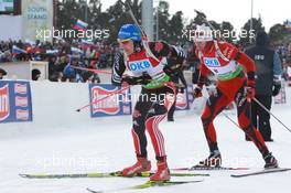 06.03.2011, Khanty-Mansiysk, Russia (RUS): Andreas Birnbacher (GER), Fischer, Rottefella, Alpina, Leki, adidas and Emil Hegle Svendsen (NOR), Madshus, Rottefella, Swix, Odlo - IBU world championships biathlon, pursuit men, Khanty-Mansiysk (RUS). www.xpb.cc. © Manzoni/xpb.cc. Every downloaded picture is fee-liable.