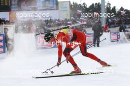 06.03.2011, Khanty-Mansiysk, Russia (RUS): Tarjei Boe (NOR), Fischer, Rottefella, Swix, ODLO falls down at the shooting range - IBU world championships biathlon, pursuit men, Khanty-Mansiysk (RUS). www.xpb.cc. © Manzoni/xpb.cc. Every downloaded picture is fee-liable.