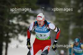 11.03.2011, Khanty-Mansiysk, Russia (RUS): Dominik Landertinger (AUT), Fischer, Rottefella, Leki - IBU world championships biathlon, relay men, Khanty-Mansiysk (RUS). www.xpb.cc. © Manzoni/xpb.cc. Every downloaded picture is fee-liable.