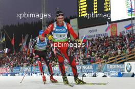 11.03.2011, Khanty-Mansiysk, Russia (RUS): Alexander Os (NOR), Fischer, Rottefella, Swix, Odlo leads Andreas Birnbacher (GER), Fischer, Rottefella, Alpina, Leki, adidas - IBU world championships biathlon, relay men, Khanty-Mansiysk (RUS). www.xpb.cc. © Manzoni/xpb.cc. Every downloaded picture is fee-liable.