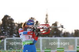 03.03.2011, Khanty-Mansiysk, Russia (RUS): Svetlana Sleptsova (RUS), Fischer, Rottefella, Alpina, Swix, adidas - IBU world championships biathlon, relay mixed, Khanty-Mansiysk (RUS). www.xpb.cc. © Manzoni/xpb.cc. Every downloaded picture is fee-liable.