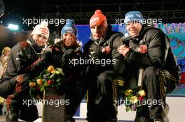 03.03.2011, Khanty-Mansiysk, Russia (RUS): (L-R): Andrea Henkel (GER), Fischer, Rottefella, Exel, adidas, Toko, Magdalena Neuner (GER), Fischer, Rottefella, Exel, adidas, Arnd Peiffer (GER), Fischer, Salomon, Swix, adidas, Michael Greis (GER), Madshus, Rottefella, OneWay, adidas - IBU world championships biathlon, relay mixed, Khanty-Mansiysk (RUS). www.xpb.cc. © Manzoni/xpb.cc. Every downloaded picture is fee-liable.