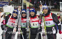 03.03.2011, Khanty-Mansiysk, Russia (RUS): (L-R): Marie Laure Brunet (FRA), Rossignol, Rottefella, Swix, Marie Dorin (FRA), Rossignol, Rottefella, OneWay, Alexis Boeuf (FRA), Salomon, Swix, OneWay, Martin Fourcade (FRA), Rossignol, Rottefella, OneWay, Odlo - IBU world championships biathlon, relay mixed, Khanty-Mansiysk (RUS). www.xpb.cc. Â© Miko/xpb.cc. Every downloaded picture is fee-liable.