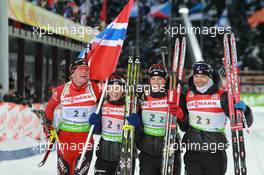 03.03.2011, Khanty-Mansiysk, Russia (RUS): L-R: Tarjei Boe (NOR), Fischer, Rottefella, Swix, ODLO, Tora Berger (NOR), Fischer, Rottefella, Odlo, Ann Kristin Aafedt Flatland (NOR), Madshus, Rottefella, Alpina, Swix, ODLO, Ole Einar Bjoerndalen (NOR), Madshus, Rottefella, Odlo - IBU world championships biathlon, relay mixed, Khanty-Mansiysk (RUS). www.xpb.cc. © Manzoni/xpb.cc. Every downloaded picture is fee-liable.