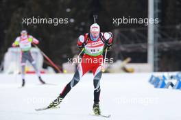 03.03.2011, Khanty-Mansiysk, Russia (RUS): Dominik Landertinger (AUT), Fischer, Rottefella, Leki - IBU world championships biathlon, relay mixed, Khanty-Mansiysk (RUS). www.xpb.cc. © Manzoni/xpb.cc. Every downloaded picture is fee-liable.