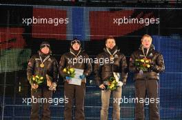 03.03.2011, Khanty-Mansiysk, Russia (RUS): (L-R): Tora Berger (NOR), Fischer, Rottefella, Odlo, Ann Kristin Aafedt Flatland (NOR), Madshus, Rottefella, Alpina, Swix, ODLO, Ole Einar Bjoerndalen (NOR), Madshus, Rottefella, Odlo, Tarjei Boe (NOR), Fischer, Rottefella, Swix, ODLO - IBU world championships biathlon, relay mixed, Khanty-Mansiysk (RUS). www.xpb.cc. © Manzoni/xpb.cc. Every downloaded picture is fee-liable.