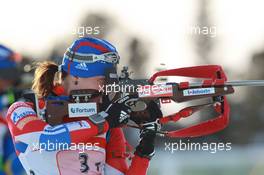 03.03.2011, Khanty-Mansiysk, Russia (RUS): Svetlana Sleptsova (RUS), Fischer, Rottefella, Alpina, Swix, adidas - IBU world championships biathlon, relay mixed, Khanty-Mansiysk (RUS). www.xpb.cc. © Manzoni/xpb.cc. Every downloaded picture is fee-liable.