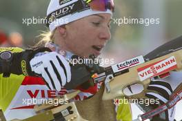 03.03.2011, Khanty-Mansiysk, Russia (RUS): Anastasiya Kuzmina (SVK), Fischer, Salomon, Exel - IBU world championships biathlon, relay mixed, Khanty-Mansiysk (RUS). www.xpb.cc. Â© Miko/xpb.cc. Every downloaded picture is fee-liable.