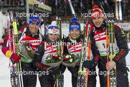 03.03.2011, Khanty-Mansiysk, Russia (RUS): (L-R): Michael Greis (GER), Madshus, Rottefella, OneWay, adidas, Andrea Henkel (GER), Fischer, Rottefella, Exel, adidas, Toko, Magdalena Neuner (GER), Fischer, Rottefella, Exel, adidas, Arnd Peiffer (GER), Fischer, Salomon, Swix, adidas - IBU world championships biathlon, relay mixed, Khanty-Mansiysk (RUS). www.xpb.cc. © Miko/xpb.cc. Every downloaded picture is fee-liable.