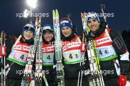 03.03.2011, Khanty-Mansiysk, Russia (RUS): L-R: Marie Laure Brunet (FRA), Rossignol, Rottefella, Swix, Marie Dorin (FRA), Rossignol, Rottefella, OneWay, Alexis Boeuf (FRA), Salomon, Swix, OneWay, Martin Fourcade (FRA), Rossignol, Rottefella, OneWay, Odlo - IBU world championships biathlon, relay mixed, Khanty-Mansiysk (RUS). www.xpb.cc. © Manzoni/xpb.cc. Every downloaded picture is fee-liable.