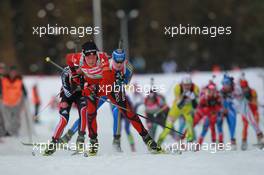 03.03.2011, Khanty-Mansiysk, Russia (RUS): Tora Berger (NOR), Fischer, Rottefella, Odlo leads Andrea Henkel (GER), Fischer, Rottefella, Exel, adidas, Toko, Helena Ekholm (SWE), Fischer, Rottefella, Leki, adidas, Anastasiya Kuzmina (SVK), Fischer, Salomon, Exel - IBU world championships biathlon, relay mixed, Khanty-Mansiysk (RUS). www.xpb.cc. © Manzoni/xpb.cc. Every downloaded picture is fee-liable.