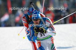 05.03.2011, Khanty-Mansiysk, Russia (RUS): Christian de Lorenzi (ITA), Atomic, Rottefella, Alpina, OneWay - IBU world championships biathlon, sprint men, Khanty-Mansiysk (RUS). www.xpb.cc. © Manzoni/xpb.cc. Every downloaded picture is fee-liable.