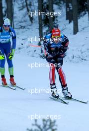 05.03.2011, Khanty-Mansiysk, Russia (RUS): Arnd Peiffer (GER), Fischer, Salomon, Swix, adidas, Klemen Bauer (SLO), Fischer, Rottefella, Alpina, Swix - IBU world championships biathlon, sprint men, Khanty-Mansiysk (RUS). www.xpb.cc. © Manzoni/xpb.cc. Every downloaded picture is fee-liable.