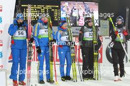 05.03.2011, Khanty-Mansiysk, Russia (RUS): (L-R): Olga Zaitseva (RUS), Madshus, Rottefella, Alpina, Swix, adidas, Helena Ekholm (SWE), Fischer, Rottefella, Leki, adidas, Ekaterina Yurlova (RUS), Fischer, Rottefella, Swix, Tora Berger (NOR), Fischer, Rottefella, Odlo, Marie Dorin (FRA), Rossignol, Rottefella, OneWay - IBU world championships biathlon, sprint women, Khanty-Mansiysk (RUS). www.xpb.cc. © Manzoni/xpb.cc. Every downloaded picture is fee-liable.