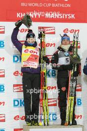 05.03.2011, Khanty-Mansiysk, Russia (RUS): Kaisa Maekaeraeinen (FIN), Fischer, Rottefella, Leki, Odlo and Magdalena Neuner (GER), Fischer, Rottefella, Exel, adidas - IBU world championships biathlon, sprint women, Khanty-Mansiysk (RUS). www.xpb.cc. © Manzoni/xpb.cc. Every downloaded picture is fee-liable.