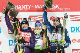 05.03.2011, Khanty-Mansiysk, Russia (RUS): (L-R): Kaisa Maekaeraeinen (FIN), Fischer, Rottefella, Leki, Odlo, Magdalena Neuner (GER), Fischer, Rottefella, Exel, adidas, Anastasiya Kuzmina (SVK), Fischer, Salomon, Exel - IBU world championships biathlon, sprint women, Khanty-Mansiysk (RUS). www.xpb.cc. © Manzoni/xpb.cc. Every downloaded picture is fee-liable.