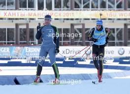 02.03.2011, Khanty-Mansiysk, Russia (RUS): Borut Nunar (SLO), IBU assistent race director and Andreas Birnbacher (GER), Fischer, Rottefella, Alpina, Leki, adidas - IBU world championships biathlon, training, Khanty-Mansiysk (RUS). www.xpb.cc. © Manzoni/xpb.cc. Every downloaded picture is fee-liable.