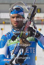 04.03.2011, Khanty-Mansiysk, Russia (RUS): Simon Fourcade (FRA), Fischer, Rottefella, Rossignol, Swix, Odlo - IBU world championships biathlon, training, Khanty-Mansiysk (RUS). www.xpb.cc. Â© Miko/xpb.cc. Every downloaded picture is fee-liable.