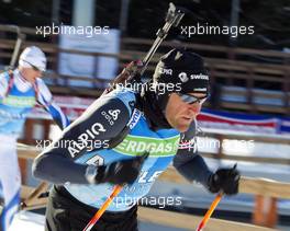 04.03.2011, Khanty-Mansiysk, Russia (RUS): Matthias Simmen (SUI), Rossignol, Rottefella, Exel, ODLO - IBU world championships biathlon, training, Khanty-Mansiysk (RUS). www.xpb.cc. Â© Miko/xpb.cc. Every downloaded picture is fee-liable.