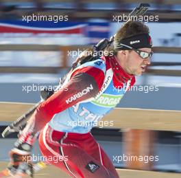 04.03.2011, Khanty-Mansiysk, Russia (RUS): Jean Philippe Leguellec (CAN), Rossignol, Rottefella, Exel - IBU world championships biathlon, training, Khanty-Mansiysk (RUS). www.xpb.cc. Â© Miko/xpb.cc. Every downloaded picture is fee-liable.