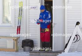 04.03.2011, Khanty-Mansiysk, Russia (RUS): Biathlon Feature: Russian Wax technician reads a book - IBU world championships biathlon, training, Khanty-Mansiysk (RUS). www.xpb.cc. Â© Miko/xpb.cc. Every downloaded picture is fee-liable.