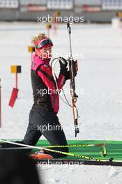 02.03.2011, Khanty-Mansiysk, Russia (RUS): Marie Dorin (FRA), Rossignol, Rottefella, OneWay - IBU world championships biathlon, training, Khanty-Mansiysk (RUS). www.xpb.cc. © Manzoni/xpb.cc. Every downloaded picture is fee-liable.