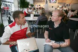 18.06.2011 Klettwitz, Germany,  Tom Kristensen (DEN), Audi Sport Team Abt Sportsline, Audi A4 DTM ist talking Martin Westerhoff (GER) AutoBild Motorsport