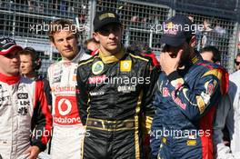 27.03.2011 Melbourne, Australia,  The F1 drivers stand for a minute silence for Japan - Formula 1 World Championship, Rd 01, Australian Grand Prix, Sunday Pre-Race Grid