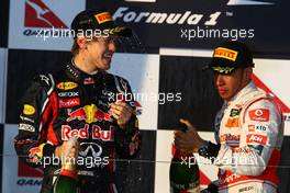 27.03.2011 Melbourne, Australia,  1st place Sebastian Vettel (GER), Red Bull Racing and 2nd Place Lewis Hamilton (GBR), McLaren Mercedes  - Formula 1 World Championship, Rd 01, Australian Grand Prix, Sunday Podium