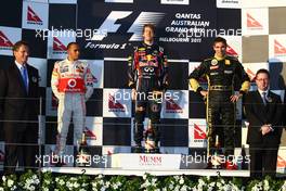 27.03.2011 Melbourne, Australia,  1st place with Sebastian Vettel (GER), Red Bull Racing with 2nd place Lewis Hamilton (GBR), McLaren Mercedes and 3rd place Vitaly Petrov (RUS), Lotus Renault GP - Formula 1 World Championship, Rd 01, Australian Grand Prix, Sunday Podium