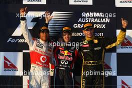 27.03.2011 Melbourne, Australia,  1st place with Sebastian Vettel (GER), Red Bull Racing with 2nd place Lewis Hamilton (GBR), McLaren Mercedes and 3rd place Vitaly Petrov (RUS), Lotus Renault GP - Formula 1 World Championship, Rd 01, Australian Grand Prix, Sunday Podium