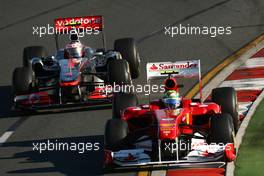 27.03.2011 Melbourne, Australia, Jenson Button (GBR), McLaren Mercedes and Felipe Massa (BRA), Scuderia Ferrari - Formula 1 World Championship, Rd 01, Australian Grand Prix, Sunday Race